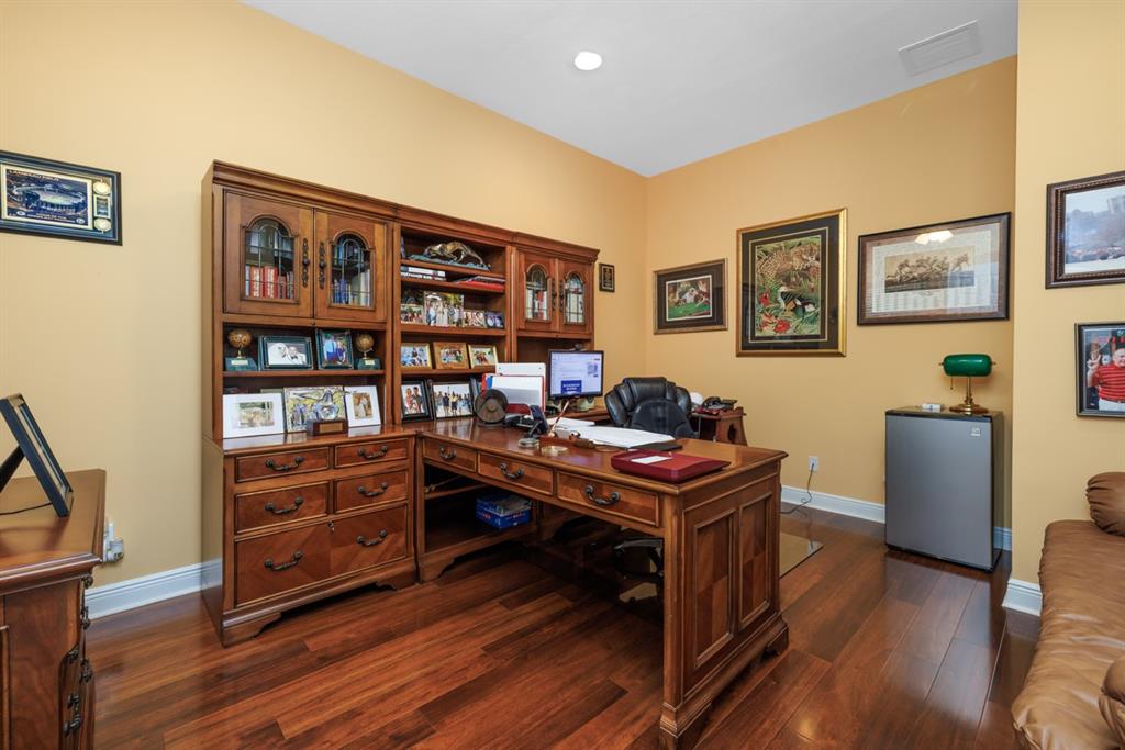 21864 Southwest Tivolo Way Port St. Lucie, FL 34986 - Photo 22 of 40 a room with furniture and wooden floor