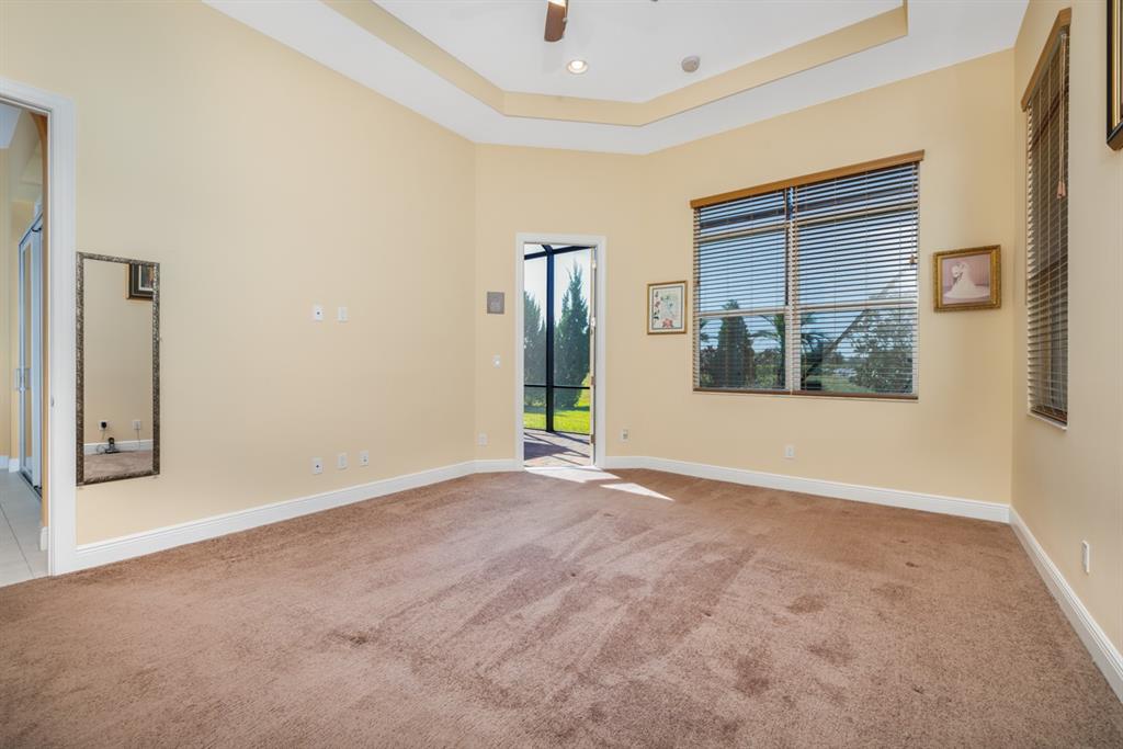 21864 Southwest Tivolo Way Port St. Lucie, FL 34986 - Photo 28 of 40 an empty room with windows and closet