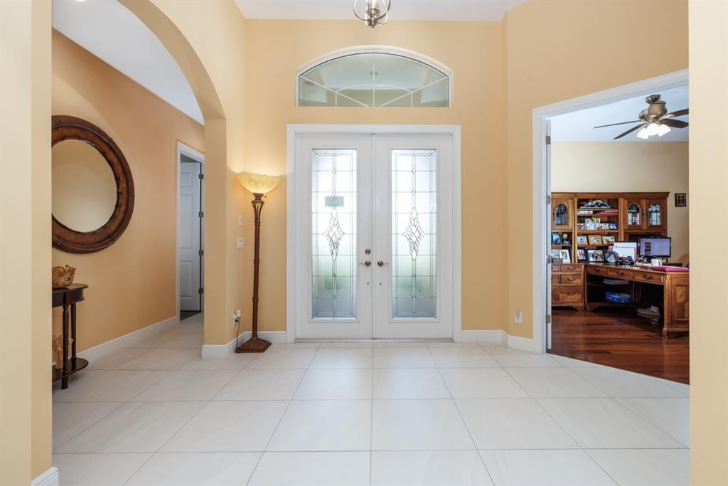 21864 Southwest Tivolo Way Port St. Lucie, FL 34986 - Photo 8 of 40 a view of an entryway with a livingroom