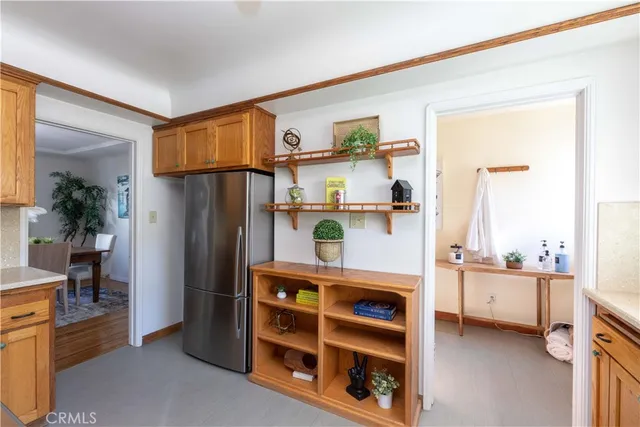 a room with furniture a rug and a window