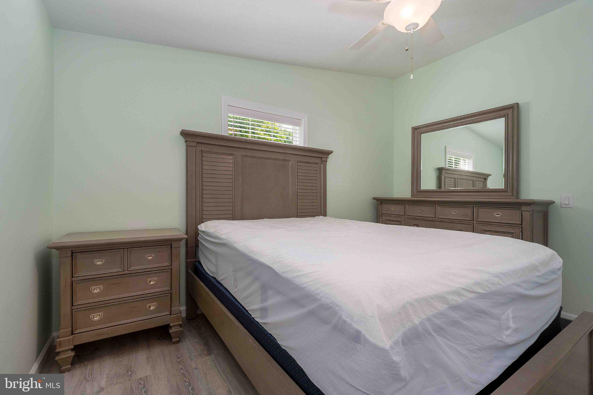 511 Hill Top Road Oakland, MD 21550 - Photo 29 of 51 Serene bedroom with soft green hues.