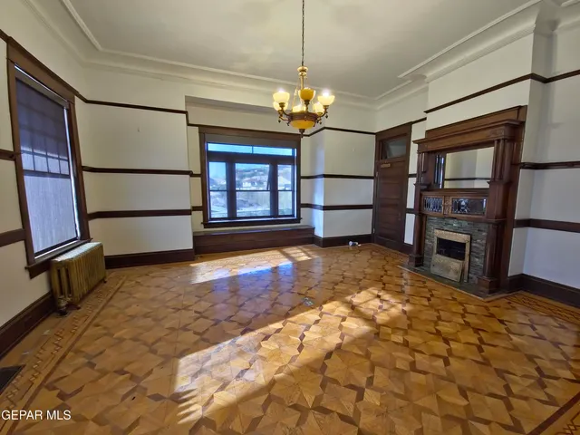 a view of a room with a large window