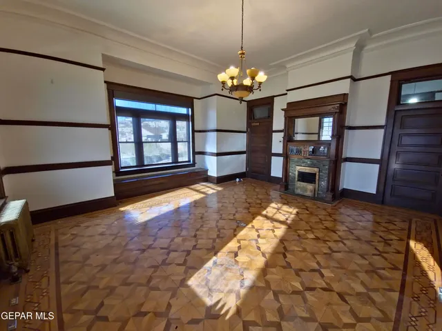 a view of livingroom with hardwood floor and a ceiling fan