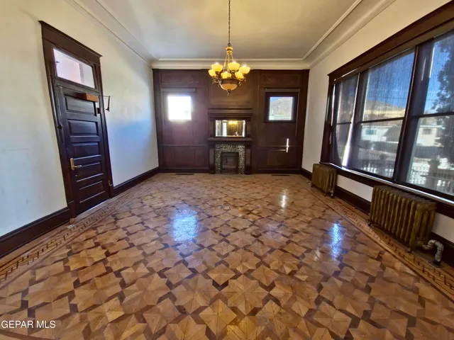 a view of entryway with a chandelier