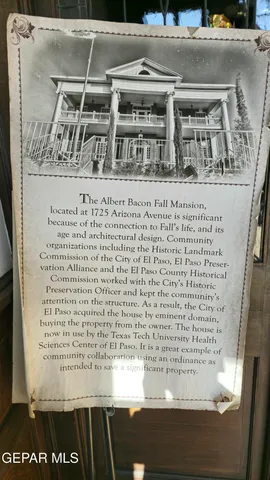 a view of entryway and hall with a dining table