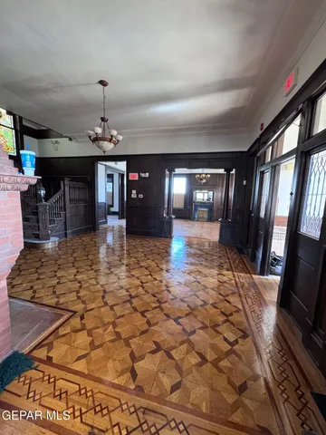 a view of livingroom with hardwood floor and a ceiling fan