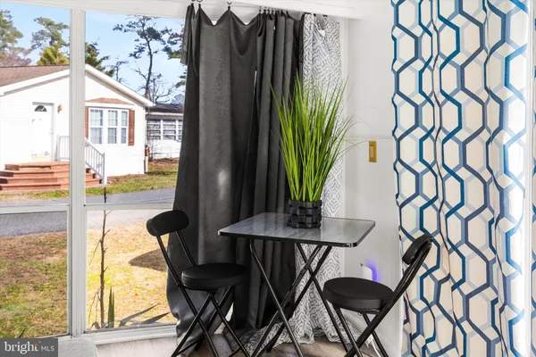 a view of balcony with patio