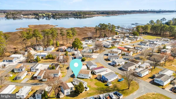 an aerial view of residential building and lake view