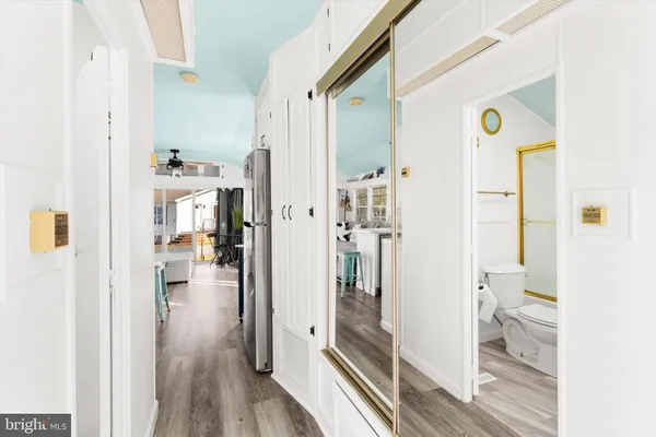 a bathroom with a shower and a sink