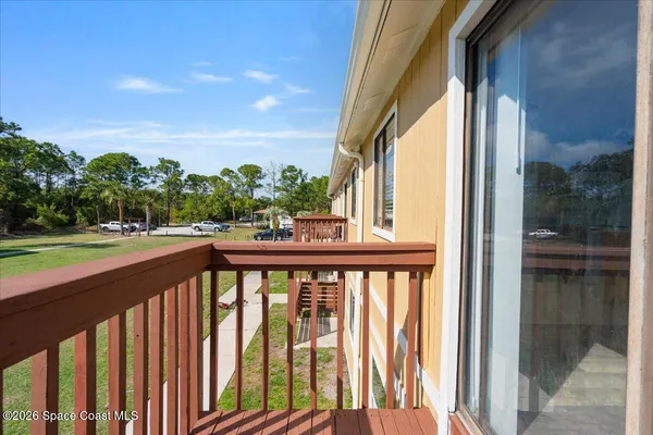 a view of a balcony with lake view