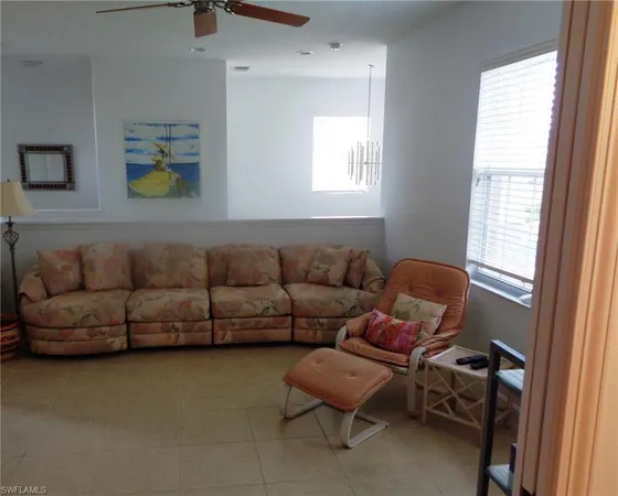 a bedroom with a bed and flat screen tv
