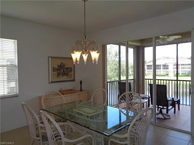 a white bath tub sitting next to a white sink