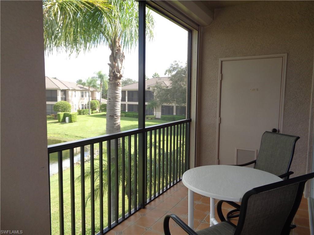 709 Regency Reserve Circle, Unit 6003 Naples, FL 34119 - Photo 35 of 44 a view of a balcony and chair