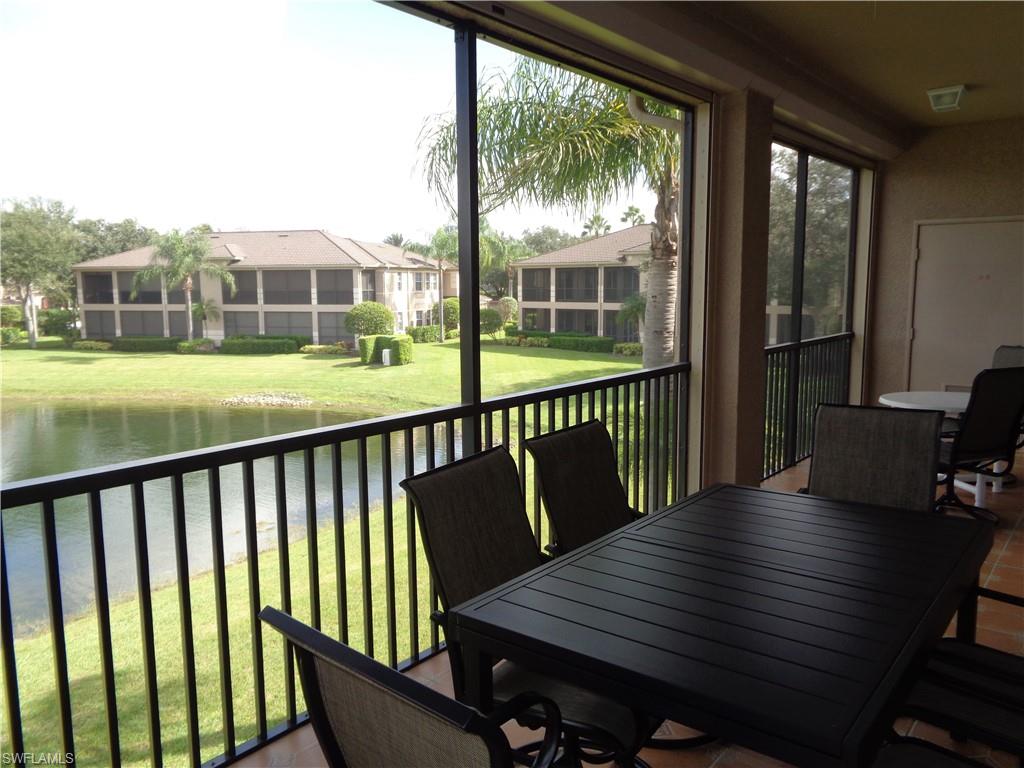 709 Regency Reserve Circle, Unit 6003 Naples, FL 34119 - Photo 41 of 44 Sunroom / solarium with a water view