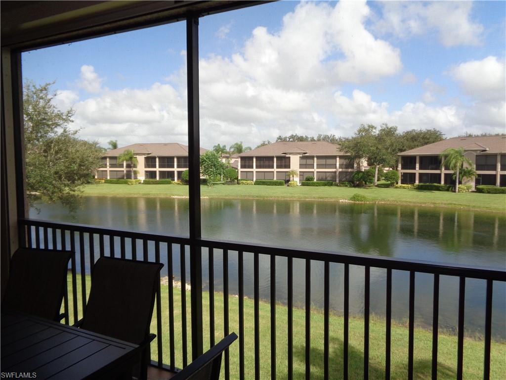709 Regency Reserve Circle, Unit 6003 Naples, FL 34119 - Photo 43 of 44 a view of a lake from a balcony