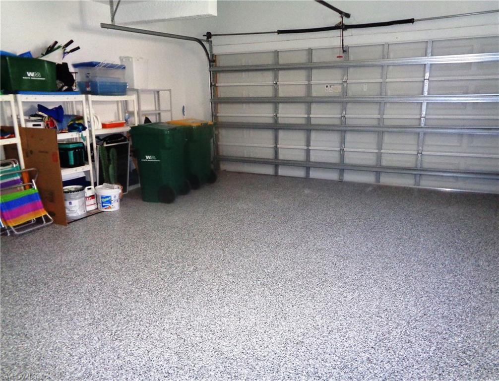 709 Regency Reserve Circle, Unit 6003 Naples, FL 34119 - Photo 44 of 44 a view of a garage with storage