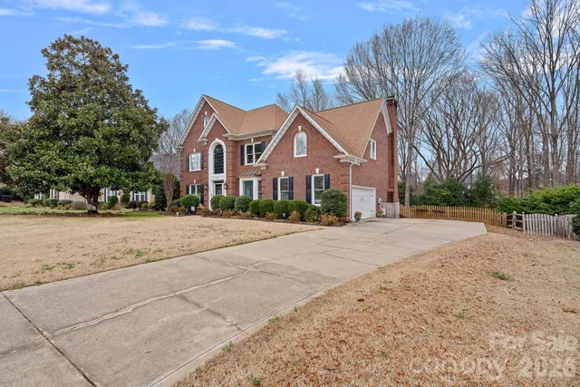 a front view of house with a yard