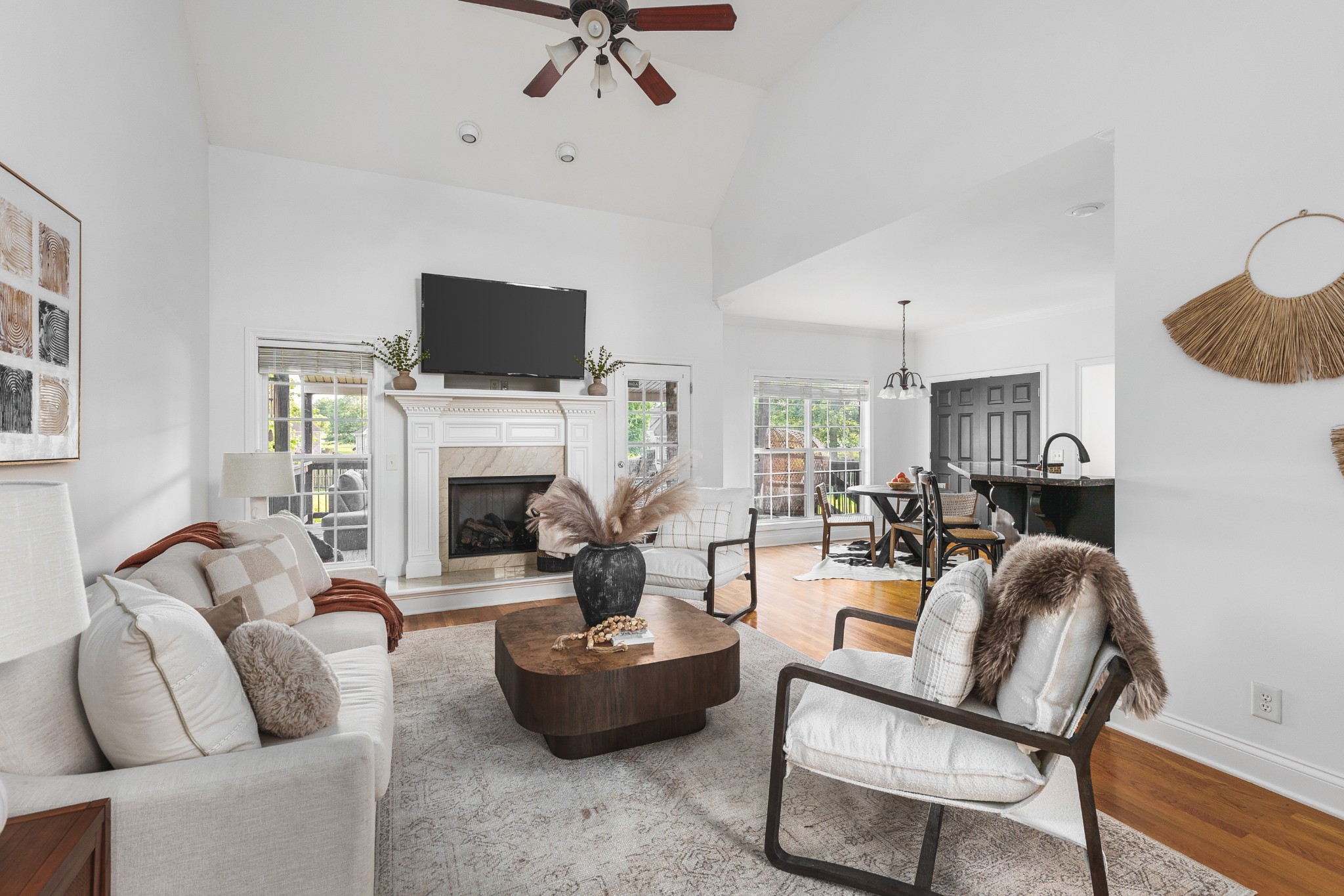 852 Bradshaw Road Lebanon, TN 37087 - Photo 5 of 41 a living room with furniture a fireplace and a flat screen tv