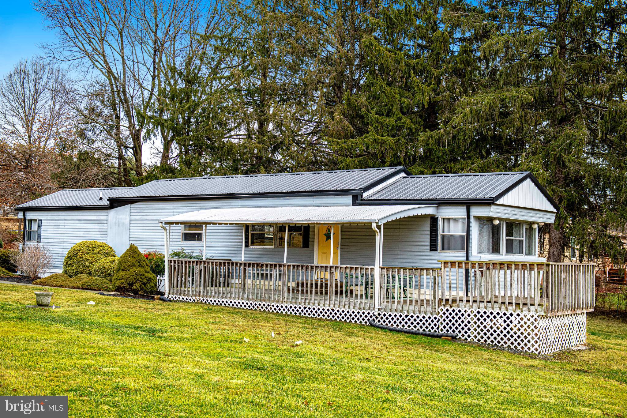 Charming home with inviting front porch.