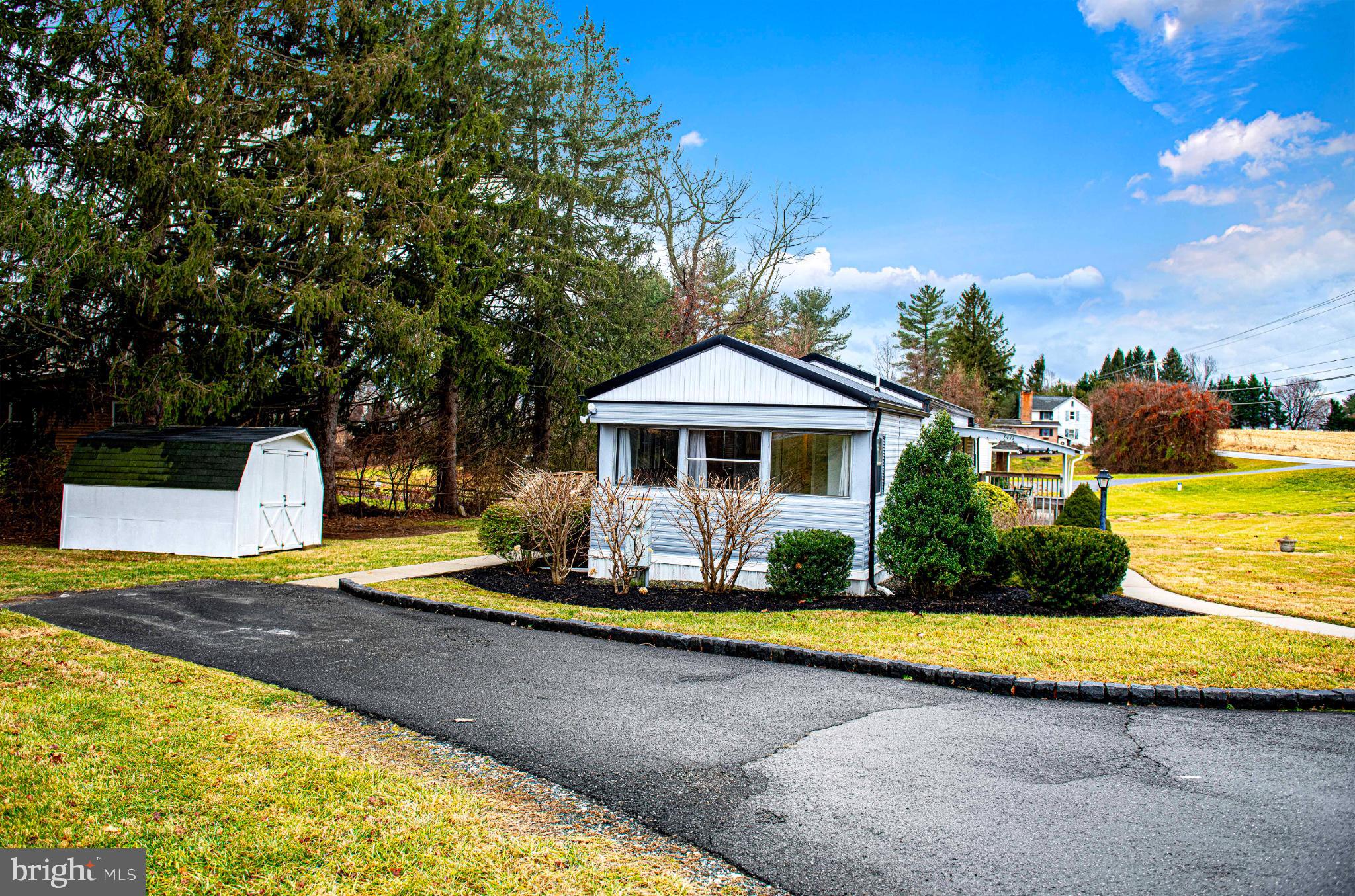 3471 Fallston Road Fallston, MD 21047 - Photo 24 of 33 Charming home with lush greenery and driveway.