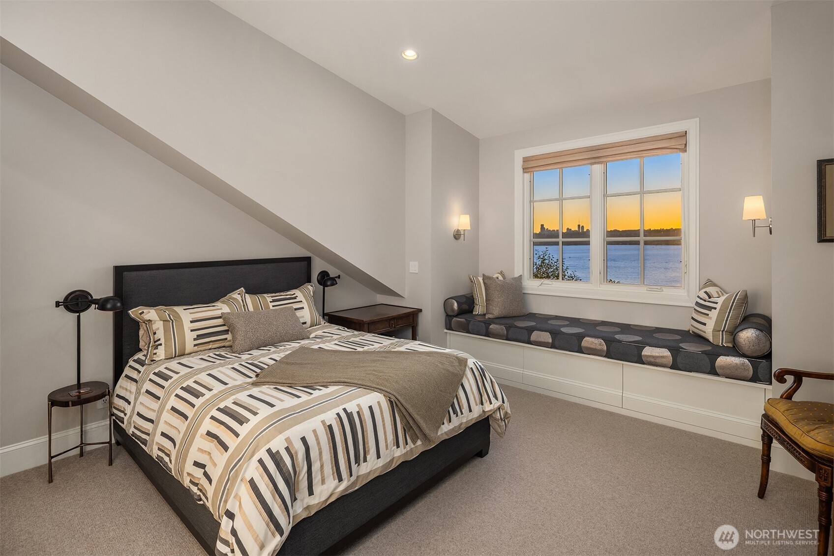 2409 Evergreen Point Road Medina, WA 98039 - Photo 21 of 40 a bedroom with a bed and wooden floor