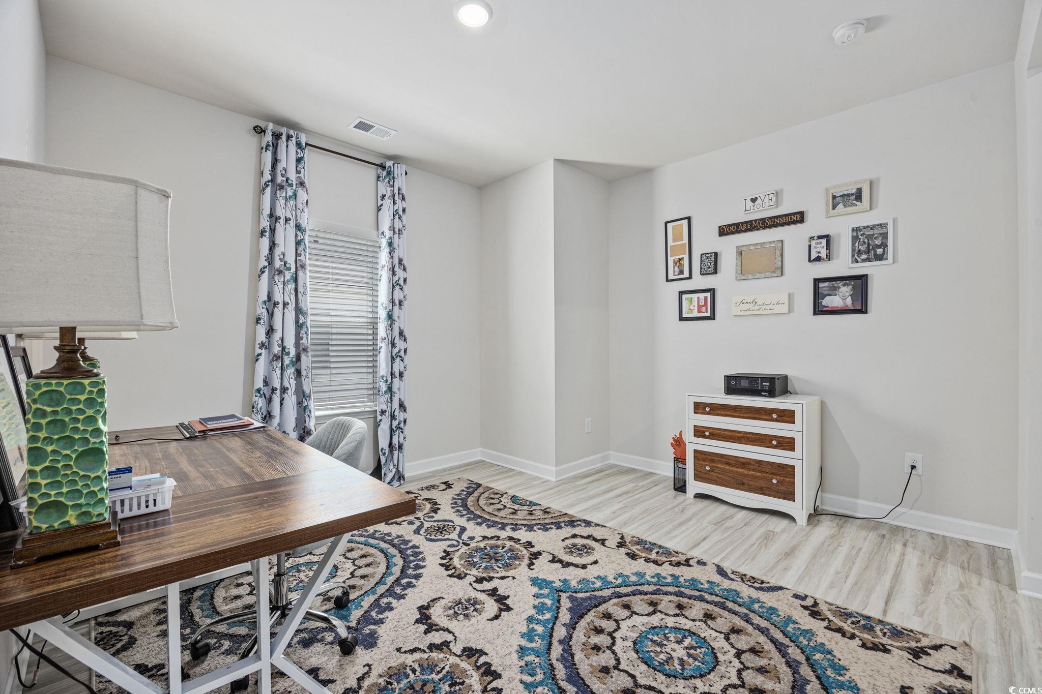 2412 Copper Mdw Loop Longs, SC 29568 - Photo 21 of 40 Home office with light wood finished floors and recessed lighting