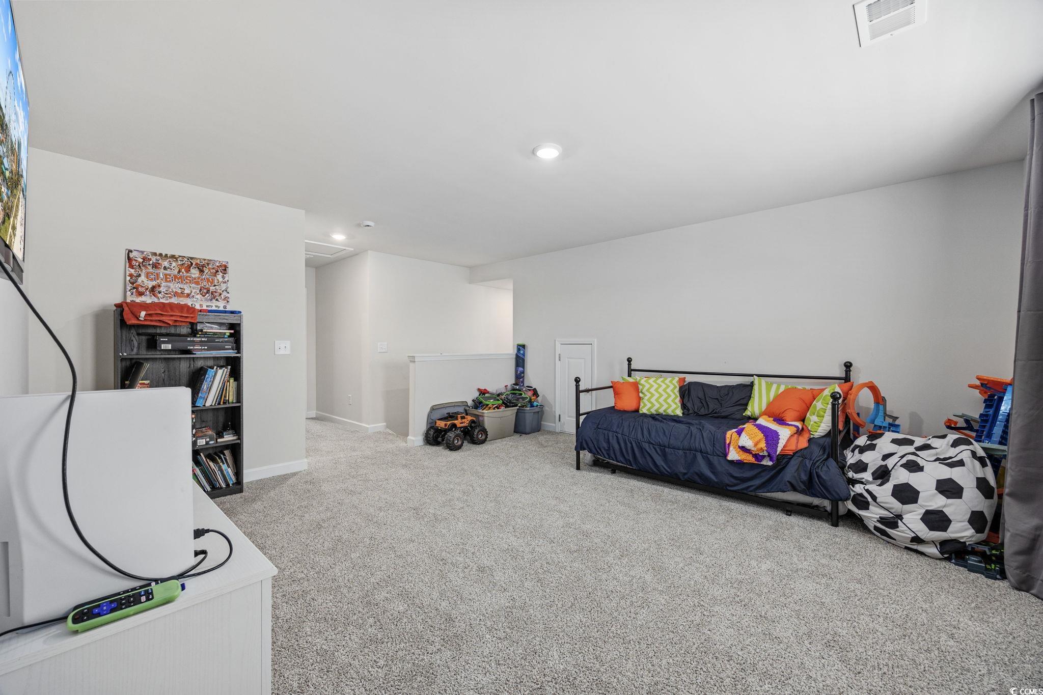 2412 Copper Mdw Loop Longs, SC 29568 - Photo 28 of 40 Playroom featuring light colored carpet and recessed lighting