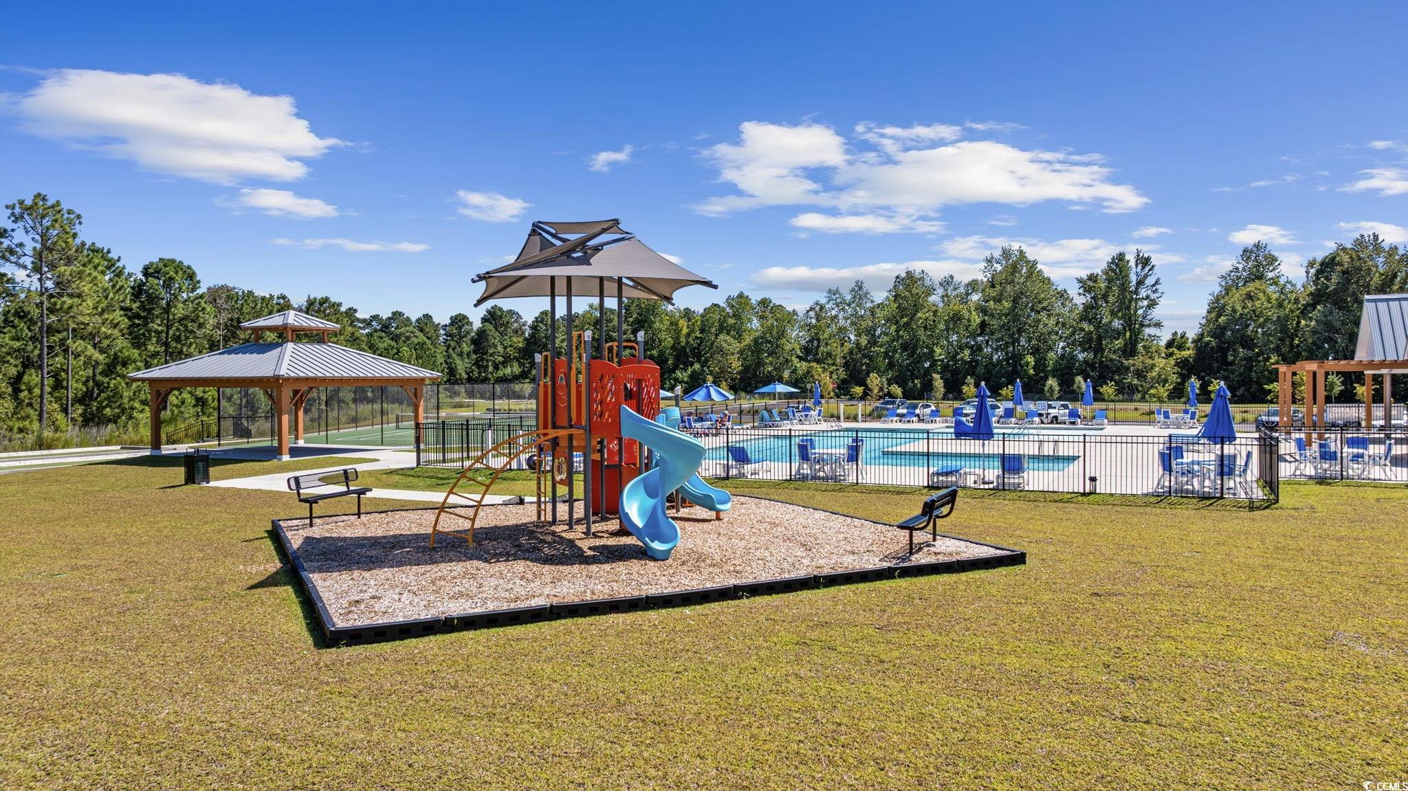 2412 Copper Mdw Loop Longs, SC 29568 - Photo 36 of 40 Communal playground with a gazebo, a patio, view of scattered trees, and a community pool