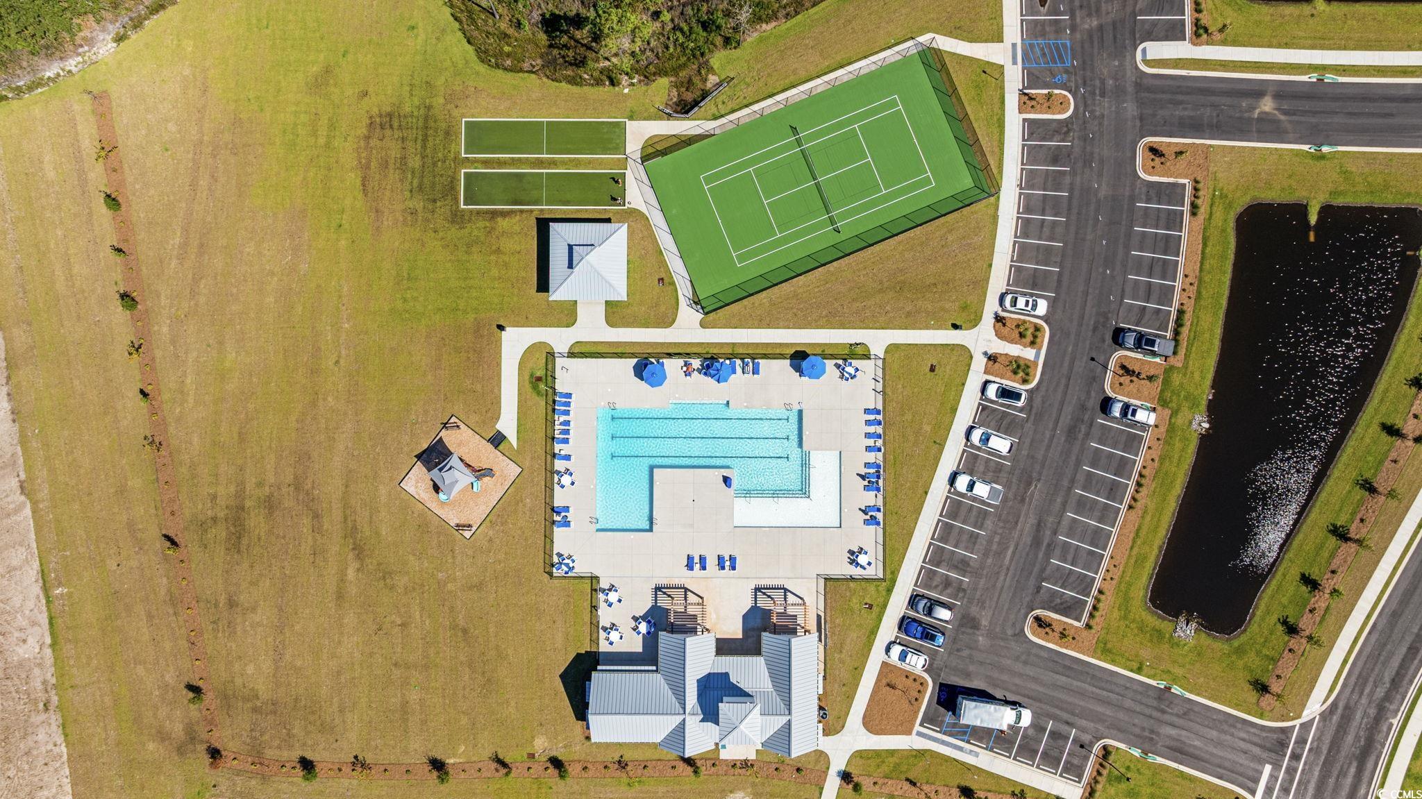 2412 Copper Mdw Loop Longs, SC 29568 - Photo 37 of 40 Aerial view of a pool and a nearby body of water