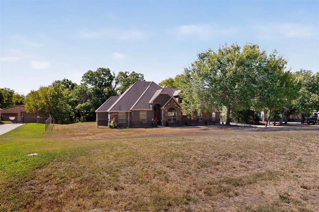 108 Winding Way Azle, TX 76020 - Photo 4 of 38 View from a distance at the road.