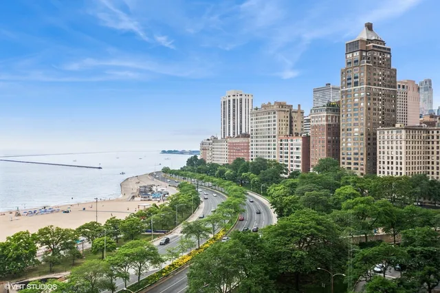 a view of a city with tall buildings