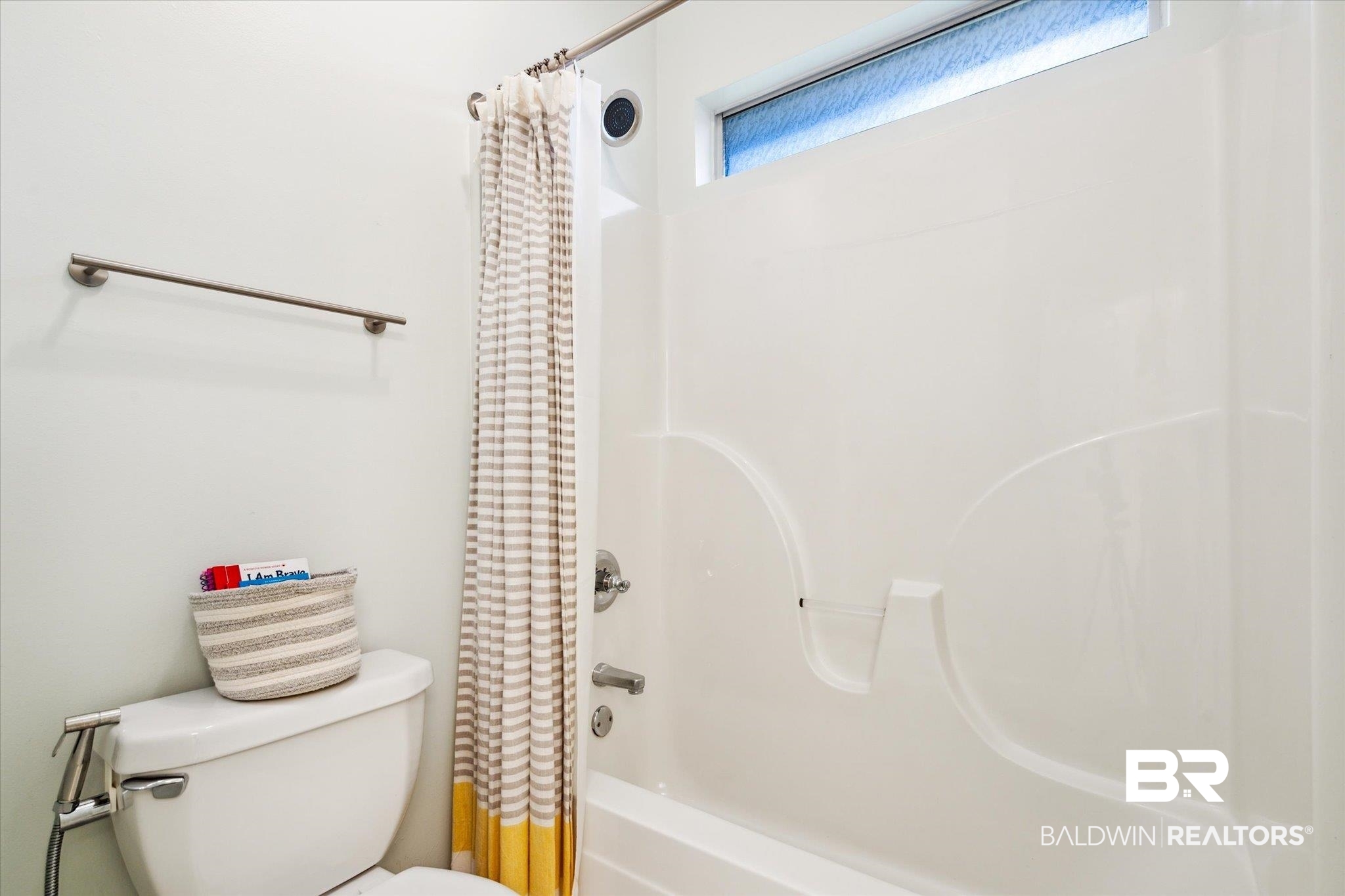 1561 William Dunn Way Mobile, AL 36695 - Photo 17 of 28 Bathroom featuring shower / bath combo with shower curtain and toilet