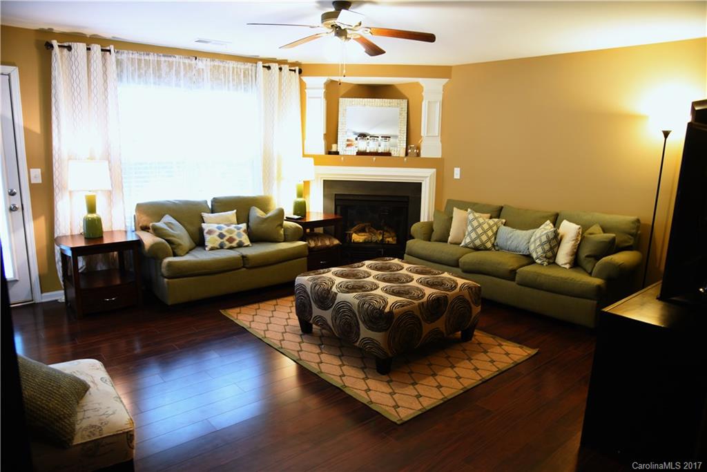 1022 Mearn Road Charlotte, NC 28216 - Photo 3 of 15 a living room with furniture and a fireplace