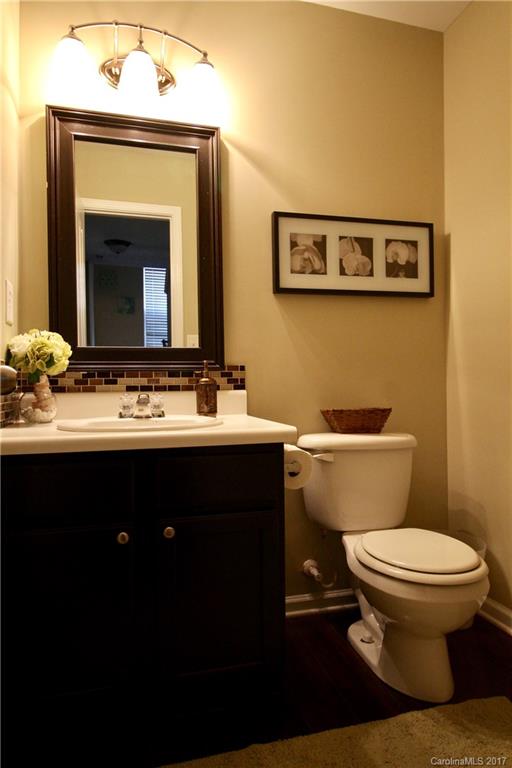 1022 Mearn Road Charlotte, NC 28216 - Photo 8 of 15 a bathroom with a sink and a toilet