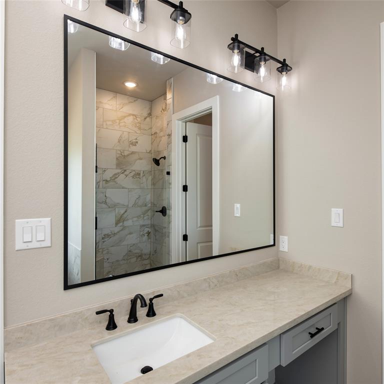 217 Fm 2258 Venus, TX 76084 - Photo 29 of 36 a bathroom with a sink and a mirror