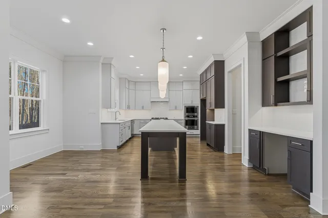a bathroom with a toilet and shower