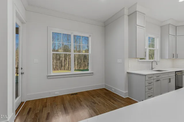 a bathroom with a sink and vanity