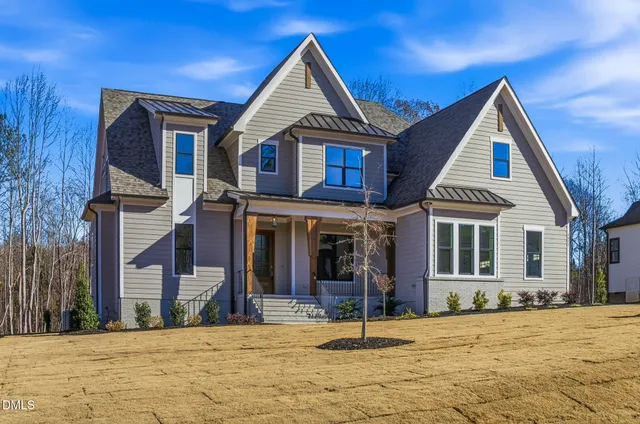 a view of a kitchen with a sink and cabinets