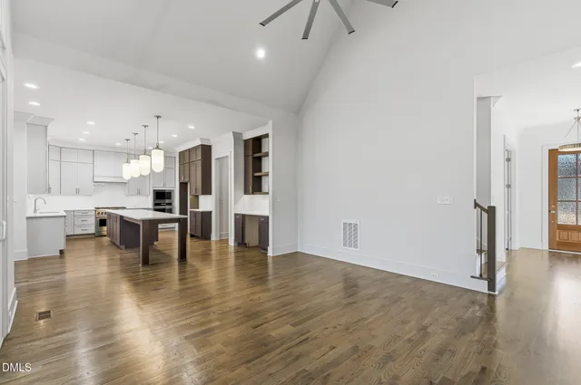 a room with a bed and a window