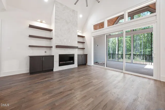 a view of a balcony with wooden floor