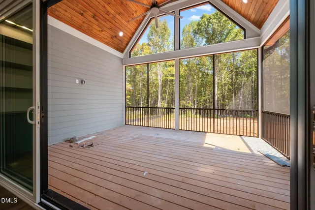 a large kitchen with kitchen island a large island in the center