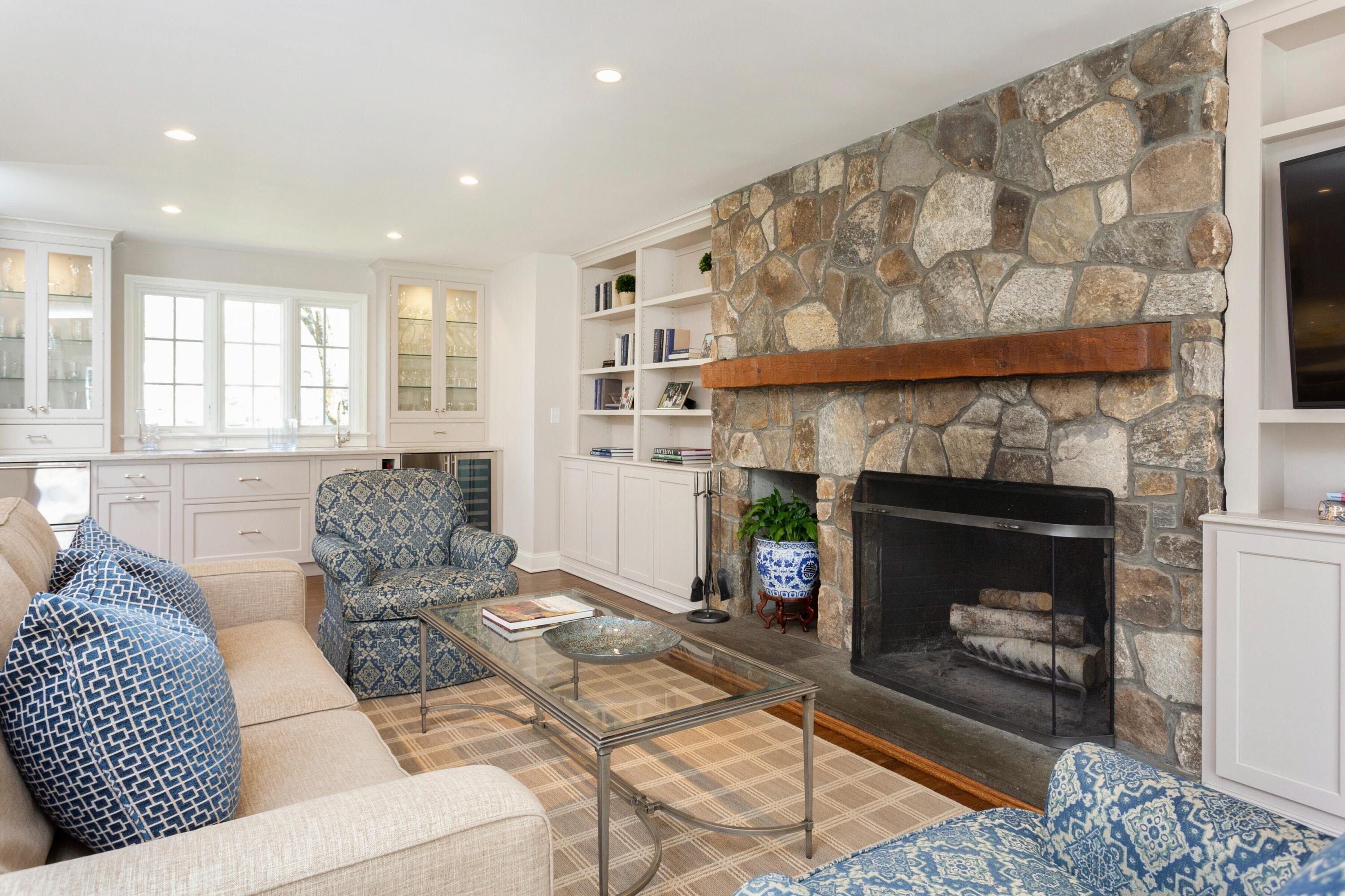 16 Half Mile Road Darien, CT 06820 - Photo 11 of 59 a living room with furniture and a fireplace