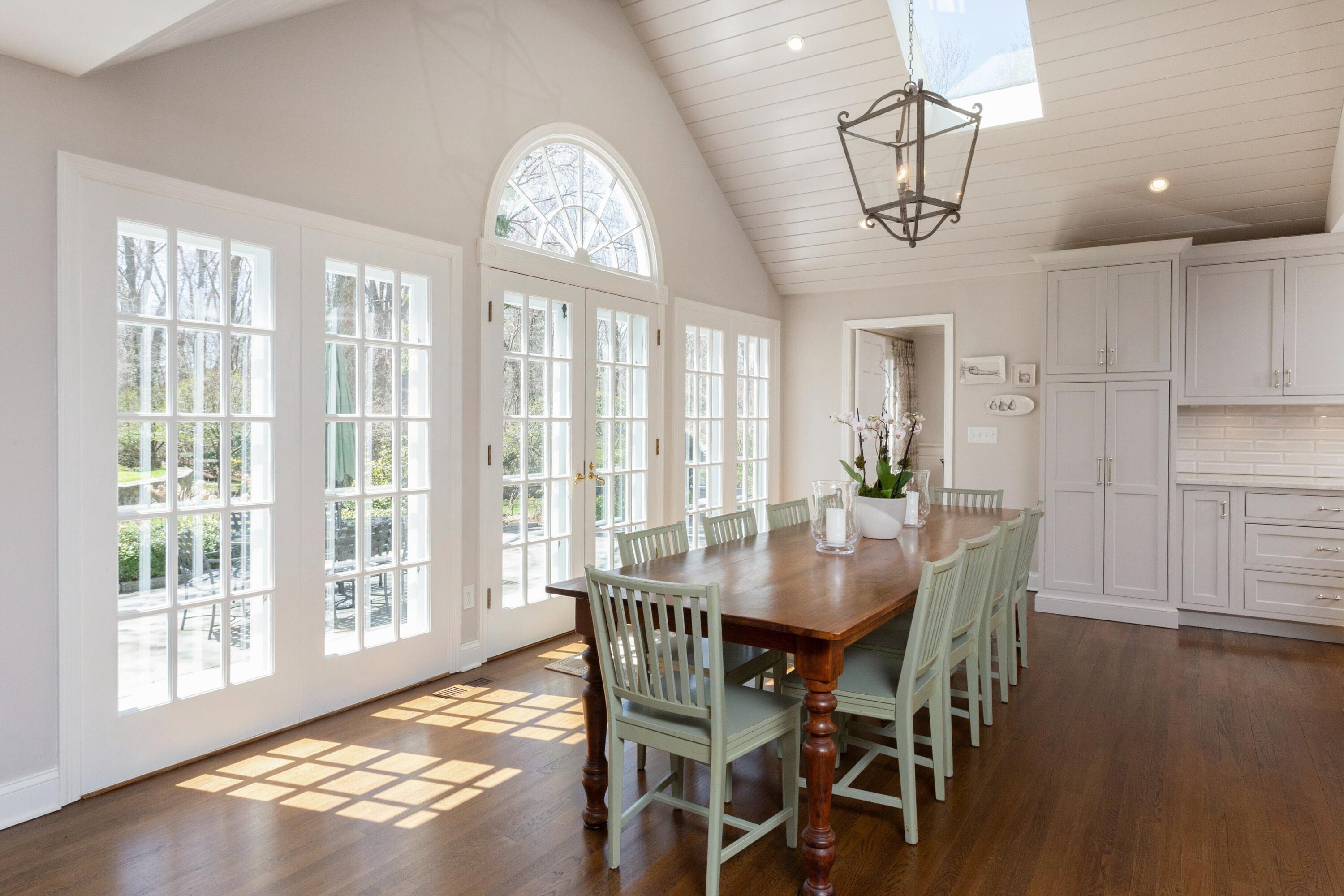 16 Half Mile Road Darien, CT 06820 - Photo 17 of 59 a view of a dining room with furniture window and wooden floor