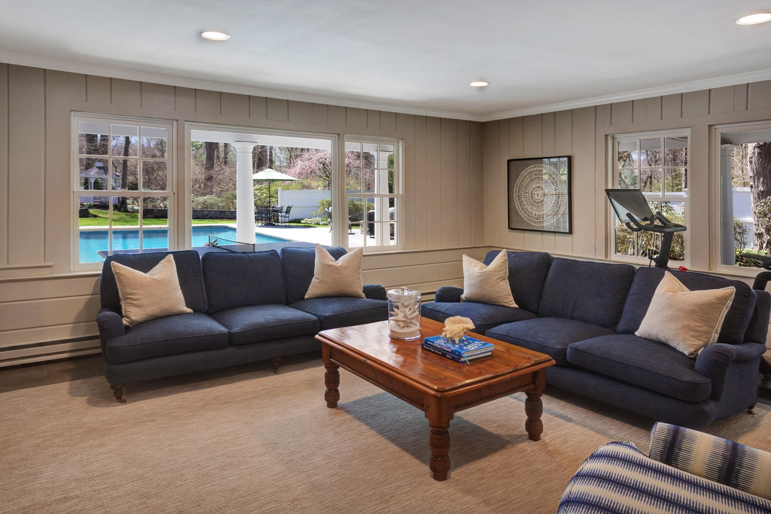 16 Half Mile Road Darien, CT 06820 - Photo 20 of 59 a living room with furniture and a large window