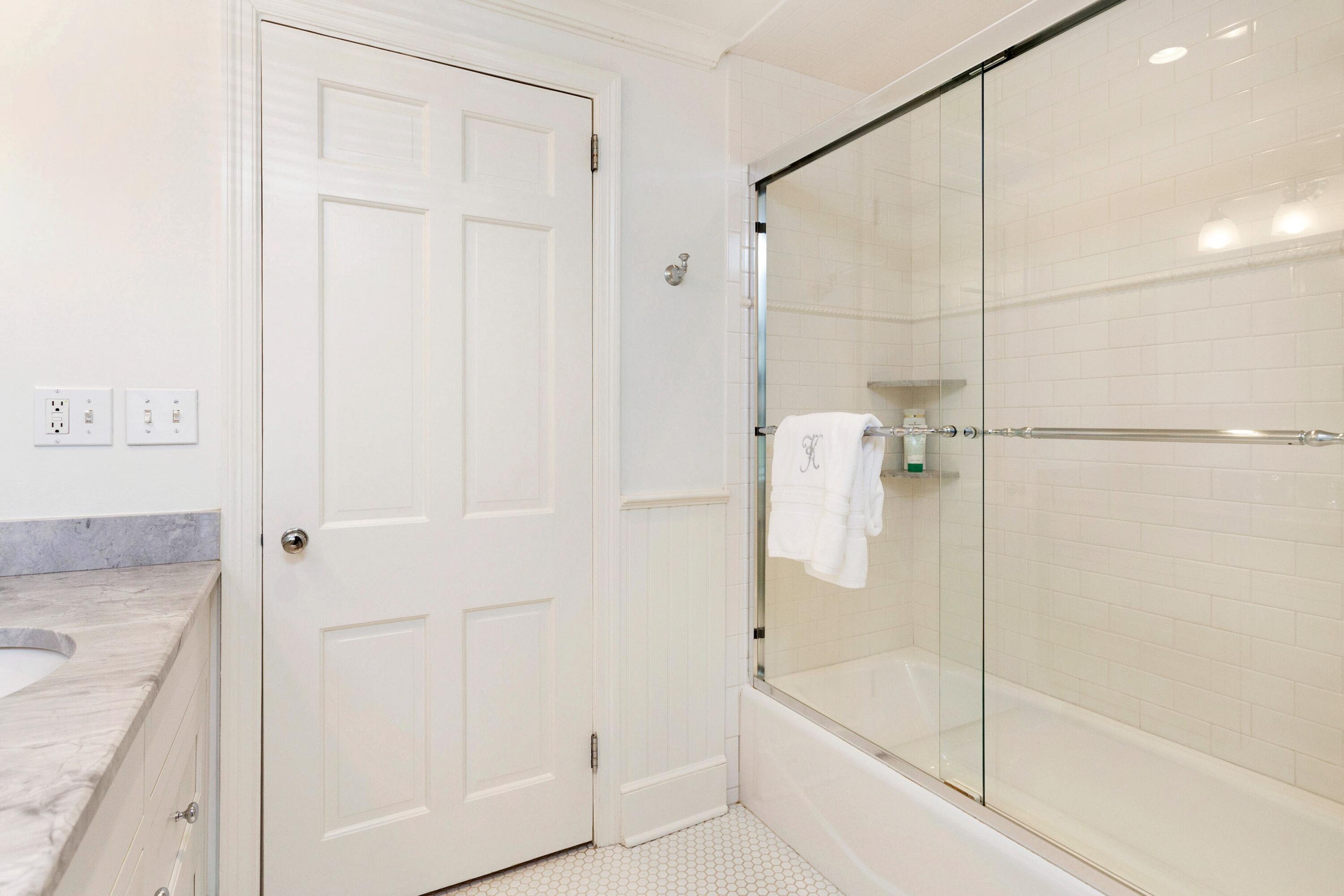 16 Half Mile Road Darien, CT 06820 - Photo 38 of 59 a bathroom with a bathtub and a shower