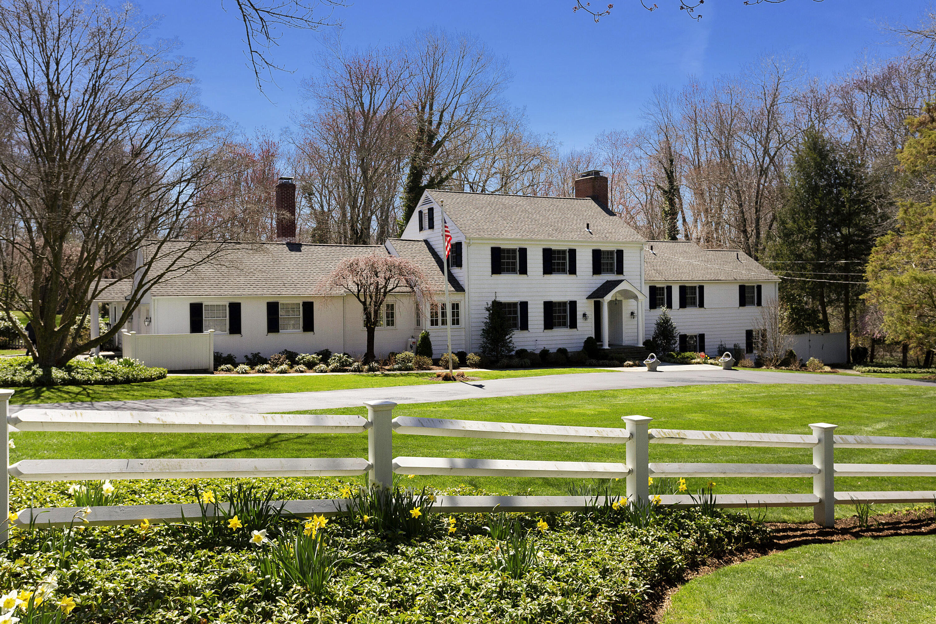 16 Half Mile Road Darien, CT 06820 - Photo 4 of 59 a front view of a house with a big yard