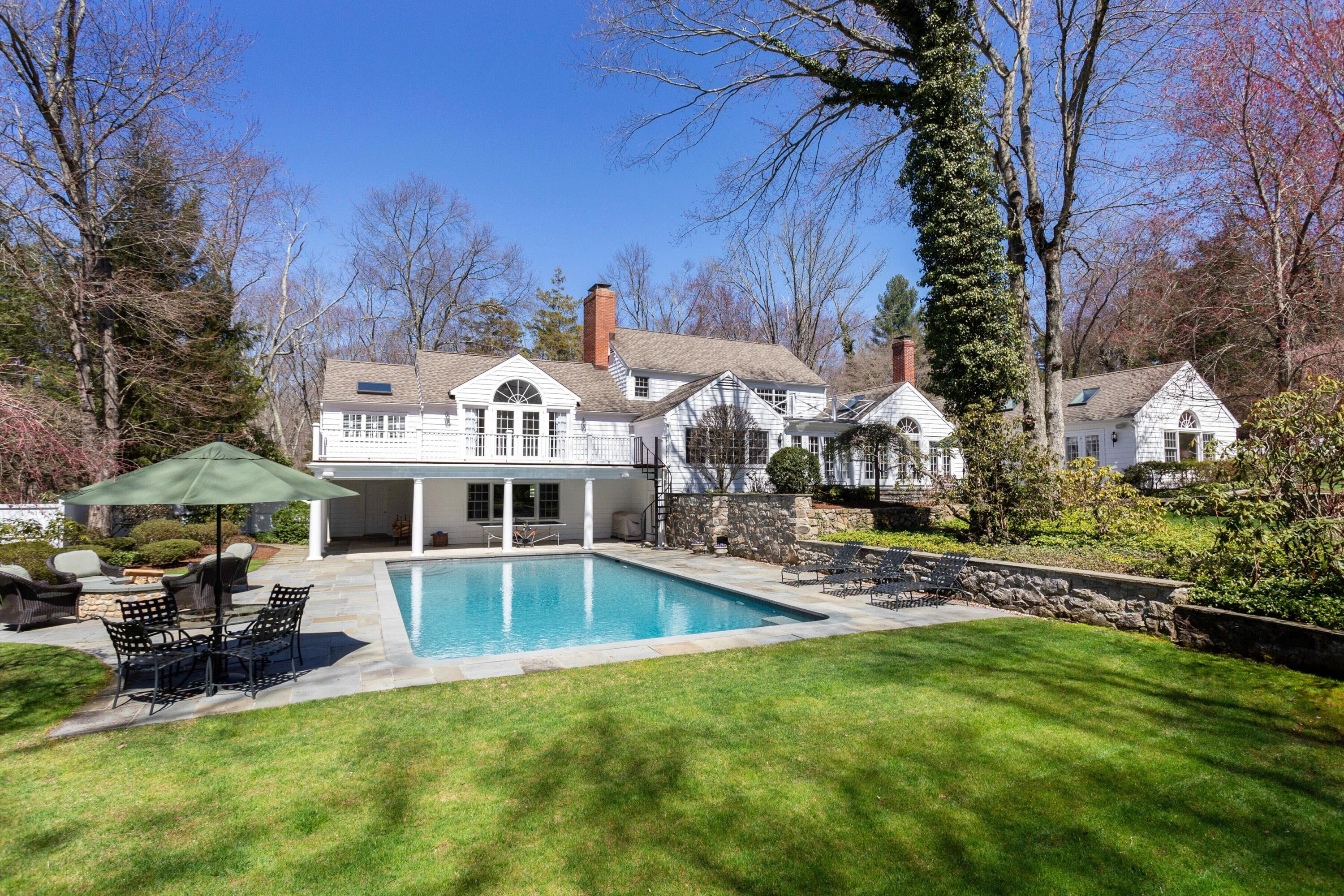 16 Half Mile Road Darien, CT 06820 - Photo 44 of 59 a view of a house with pool and sitting area