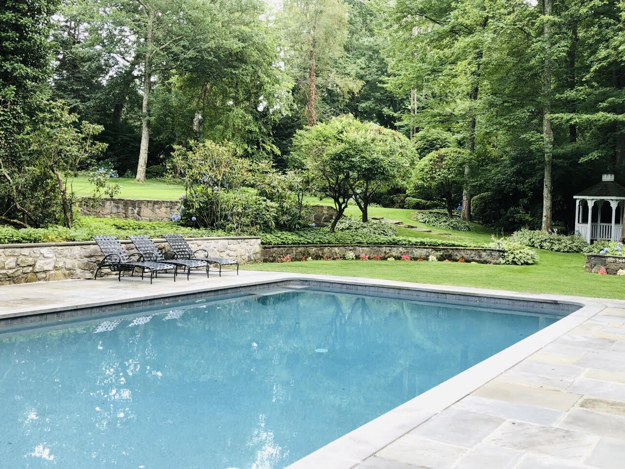 16 Half Mile Road Darien, CT 06820 - Photo 47 of 59 a view of a swimming pool and a yard