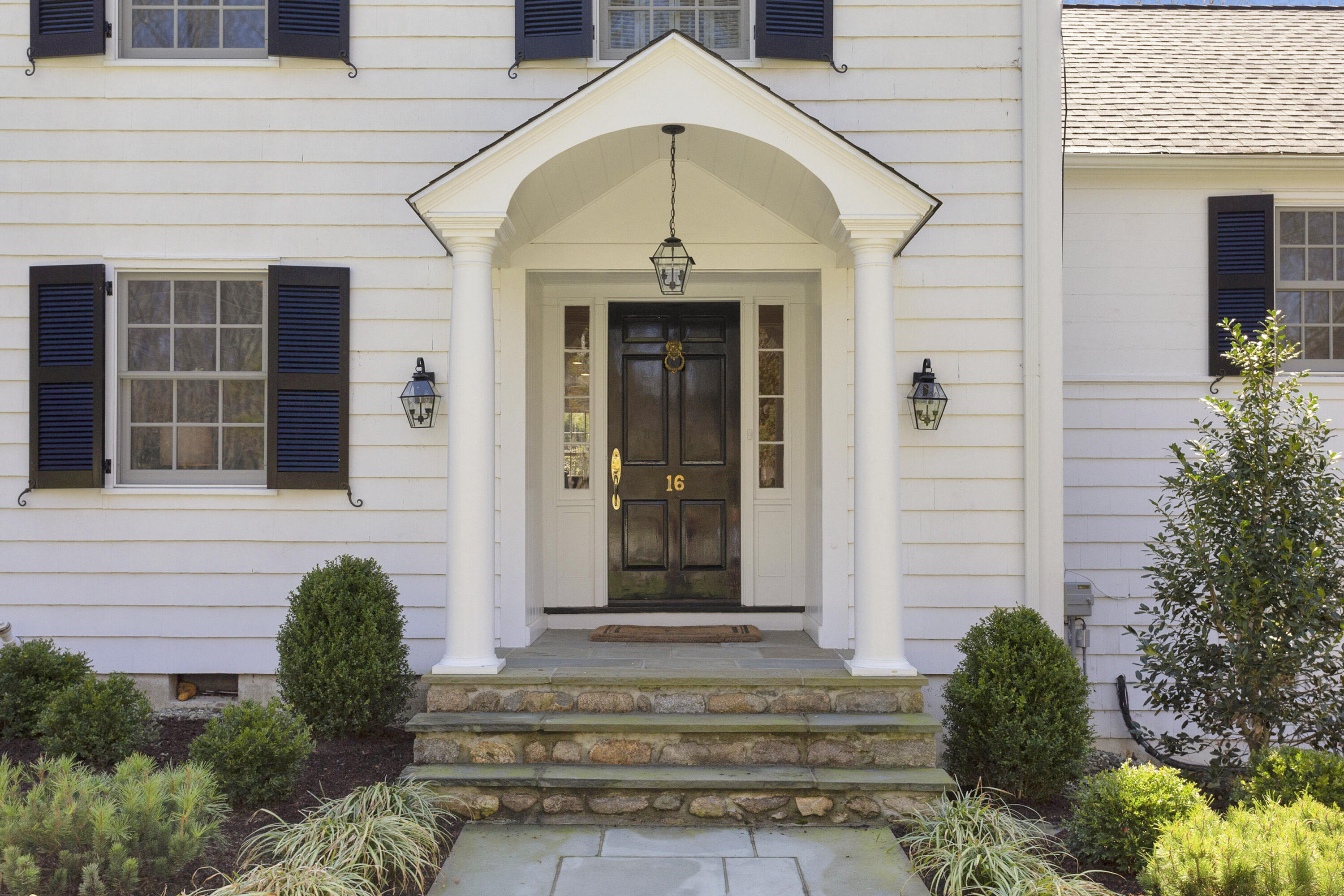 16 Half Mile Road Darien, CT 06820 - Photo 5 of 59 a front view of a house with a yard