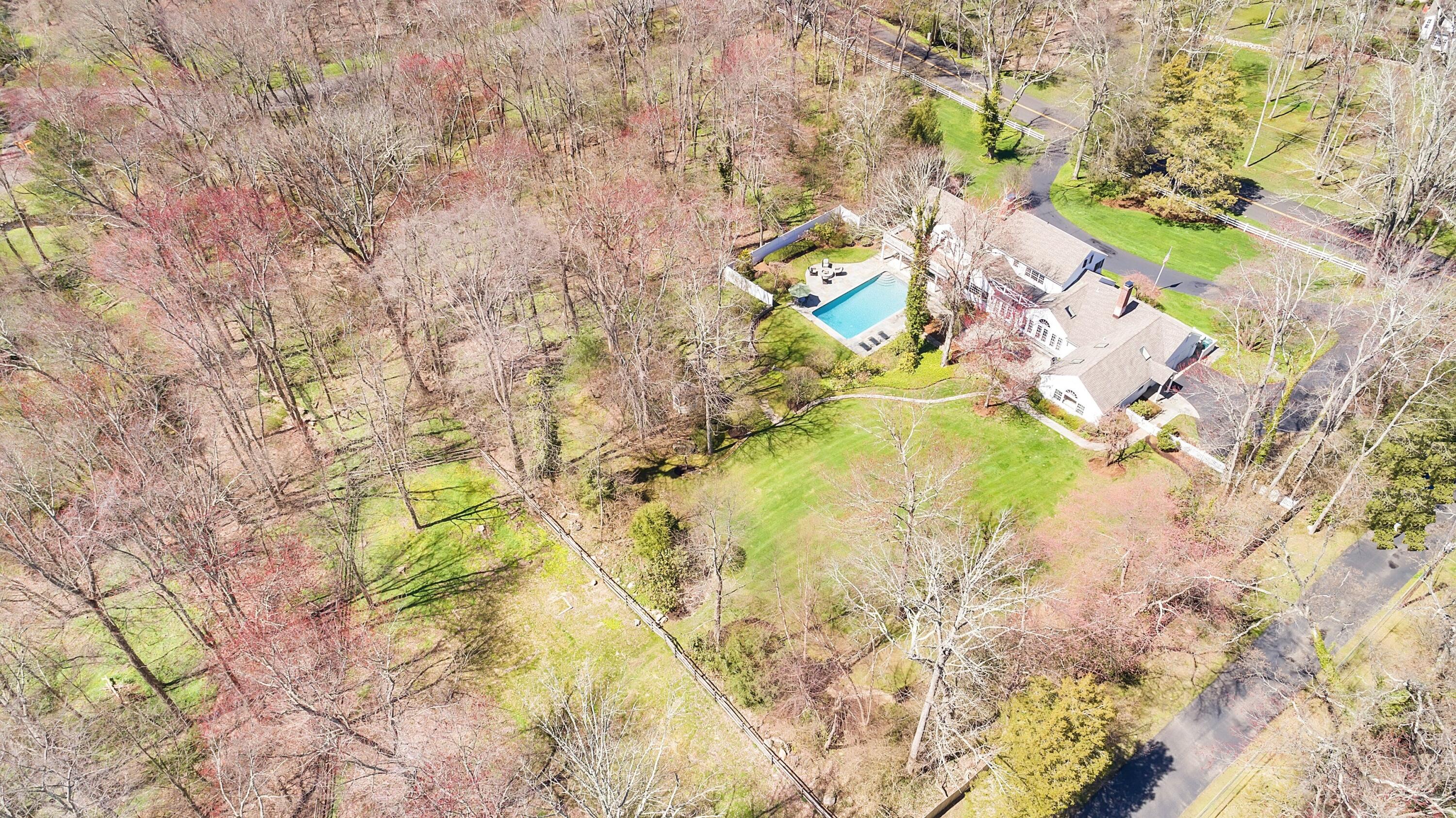 16 Half Mile Road Darien, CT 06820 - Photo 56 of 59 a bathroom with a bathtub and a shower